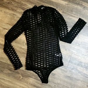 Top/body suit/bikini coverup.